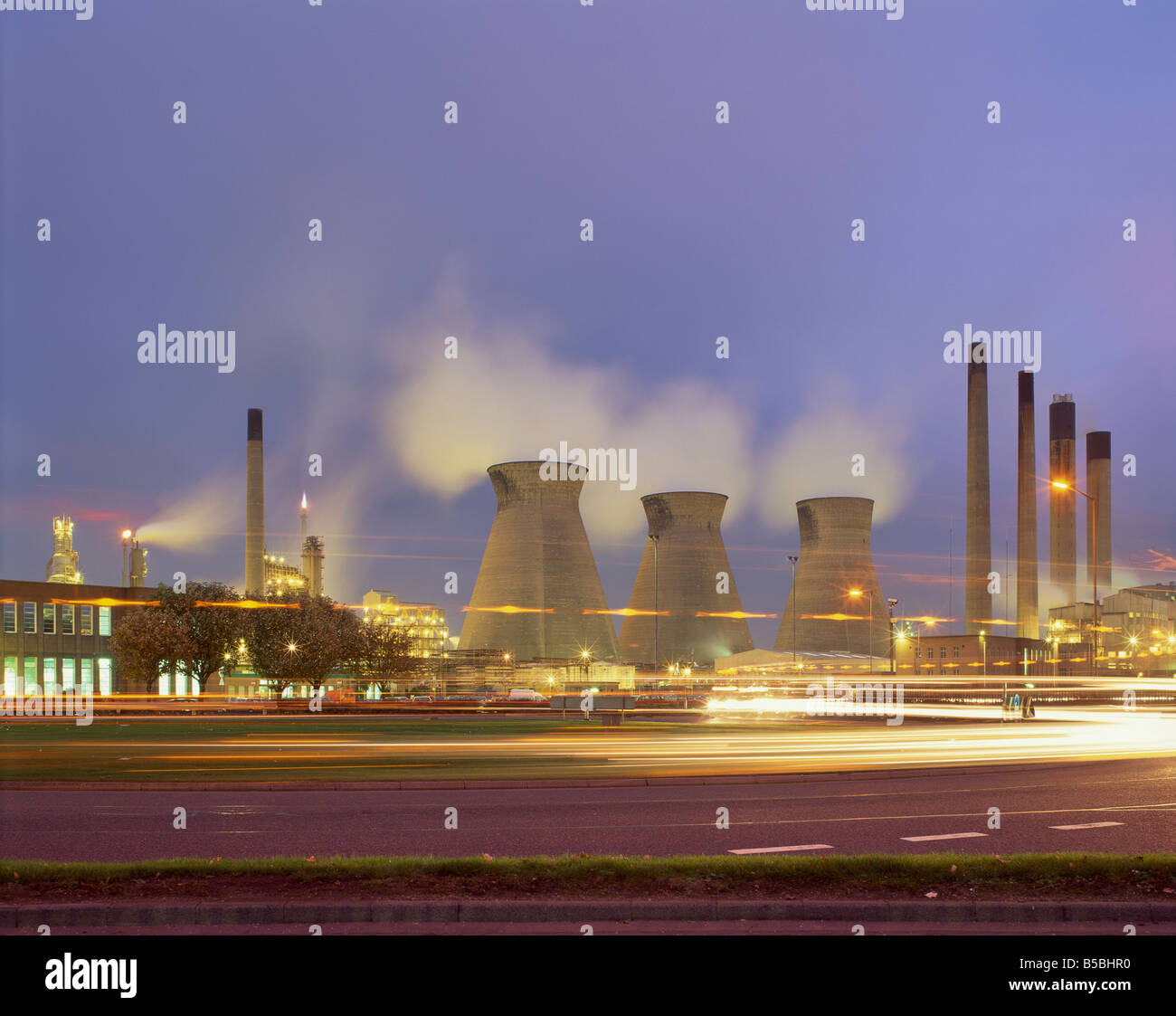 Grangemouth petro chemical plant illuminated at dusk Scotland United Kingdom Europe Stock Photo