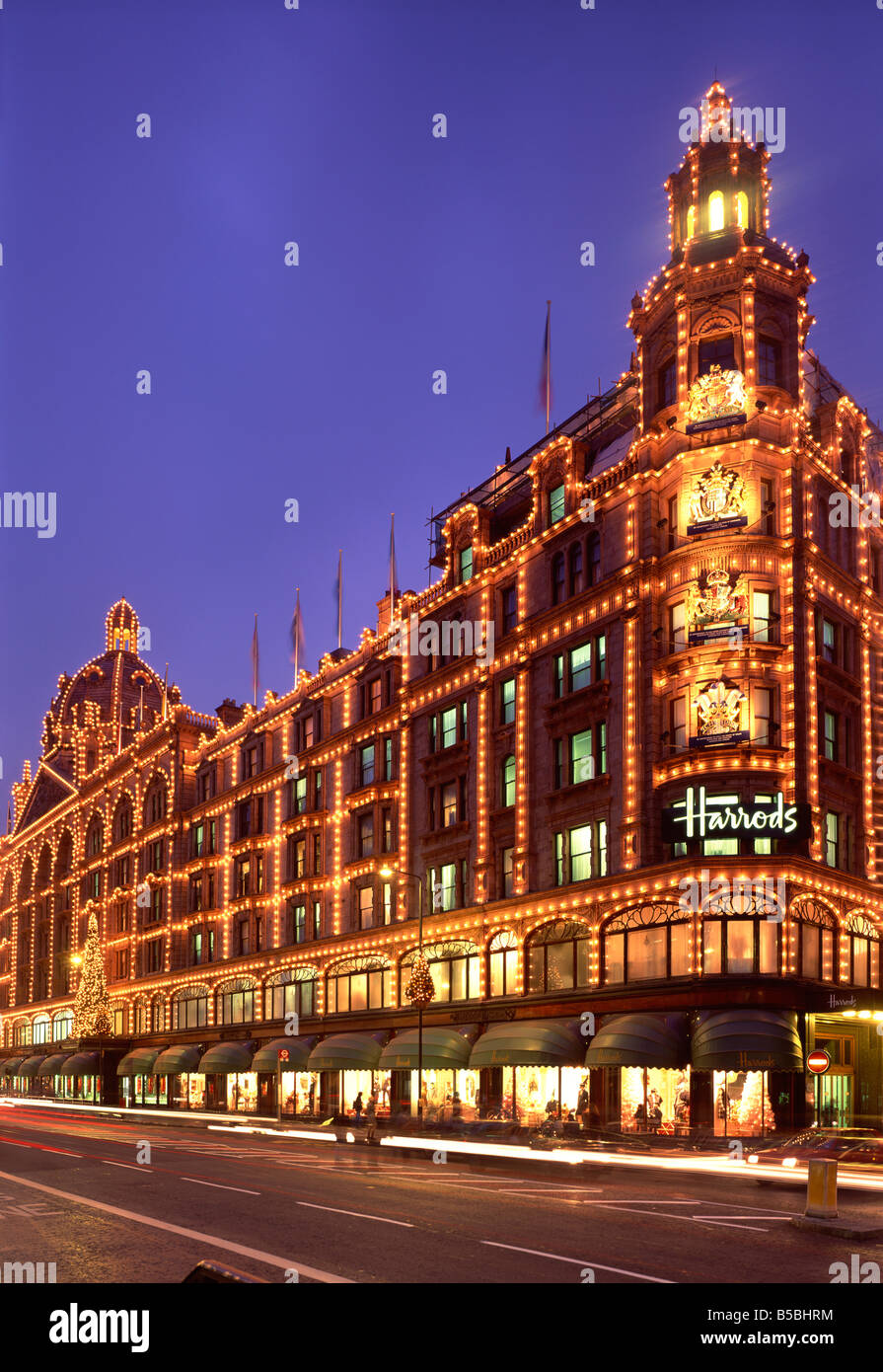 Harrods Department store illuminated at night Knightsbridge London England United Kingdom Europe Stock Photo