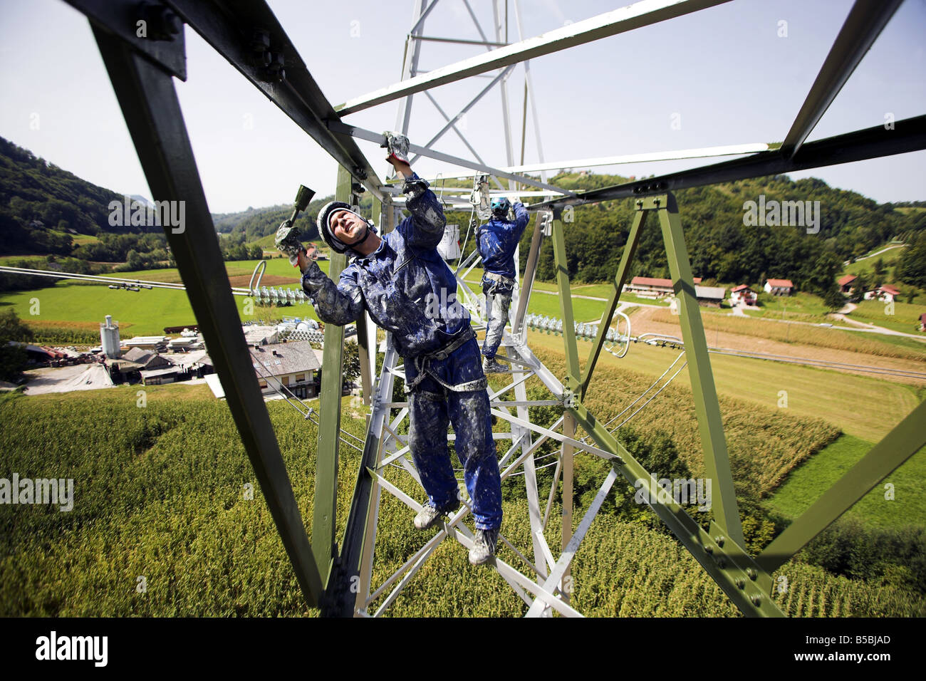 Workers maintaining the transmission line Stock Photo Alamy