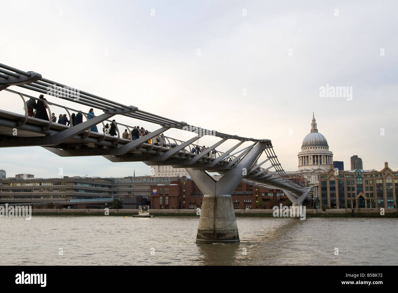 Millennium Bridge over River Thames London UK with St Pauls Cathedral in the background. Stock Photo