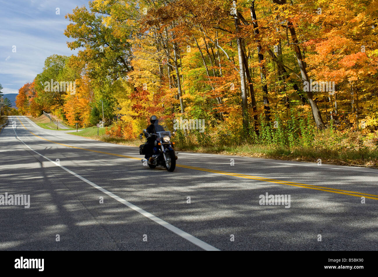 Motorcyclists riding Harley Davidsons along the Kancamagus Highway, White Mountain National Forest in New Hampshire, USA Stock Photo