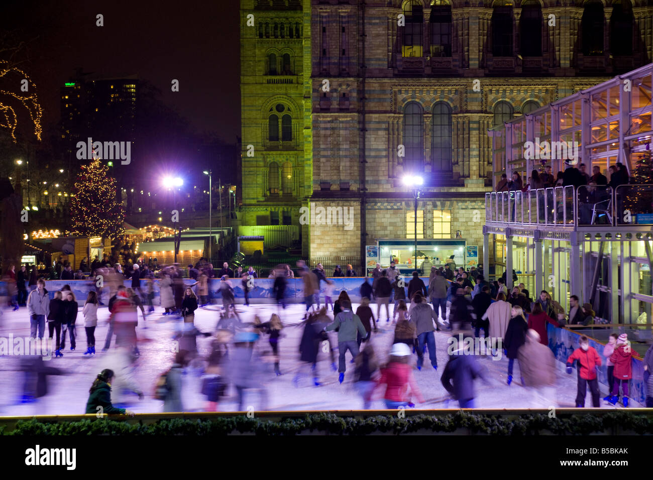 Ice skating outside the Natural History Museum, London, England, Europe