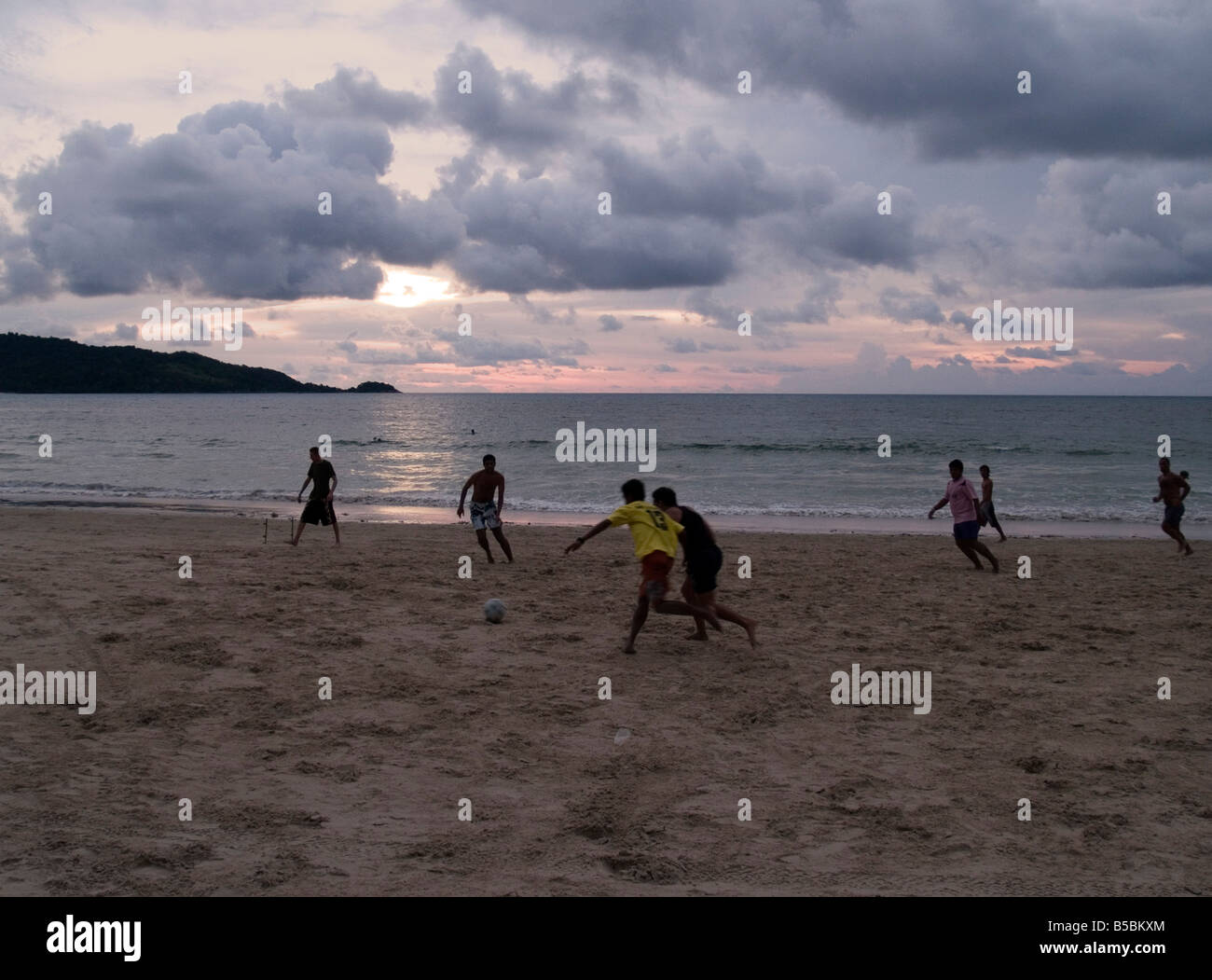 sunset soccer on the beach in Phuket Thailand Stock Photo