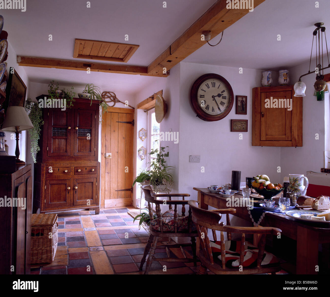 Victorian Mahogany School Clock In Cottage Hall Dining Room With