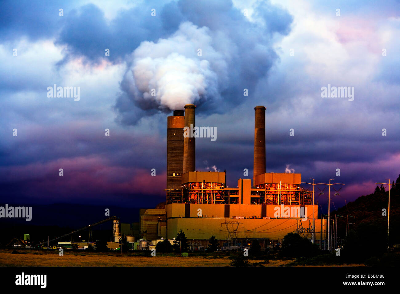 The Centralia Steam Power Plant with plumes of gas and smoke rising