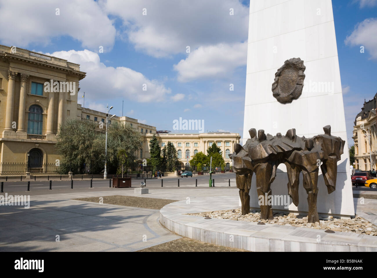 Bucharest Romania Revolution Monument and bronze statues memorial to the 1989 dead in Revolution Square in city centre Stock Photo