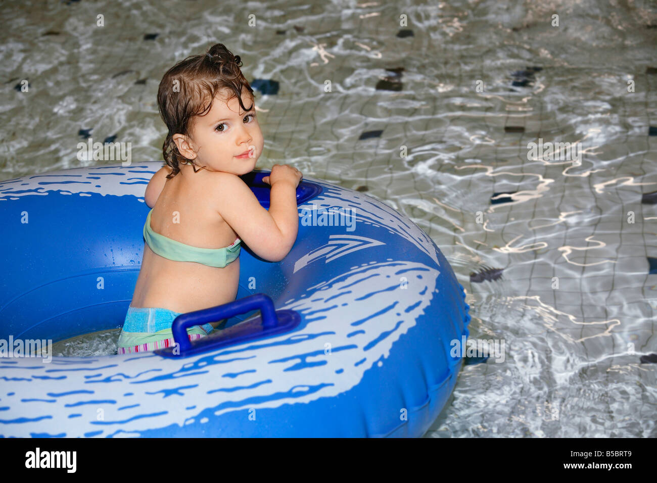 Girl in inner tube Stock Photo Alamy