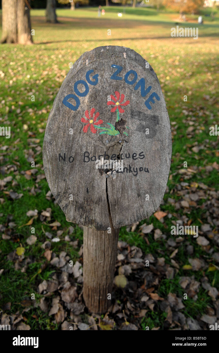Dog Zone wooden funny sign in Queens Park Brighton October 2008 Stock ...