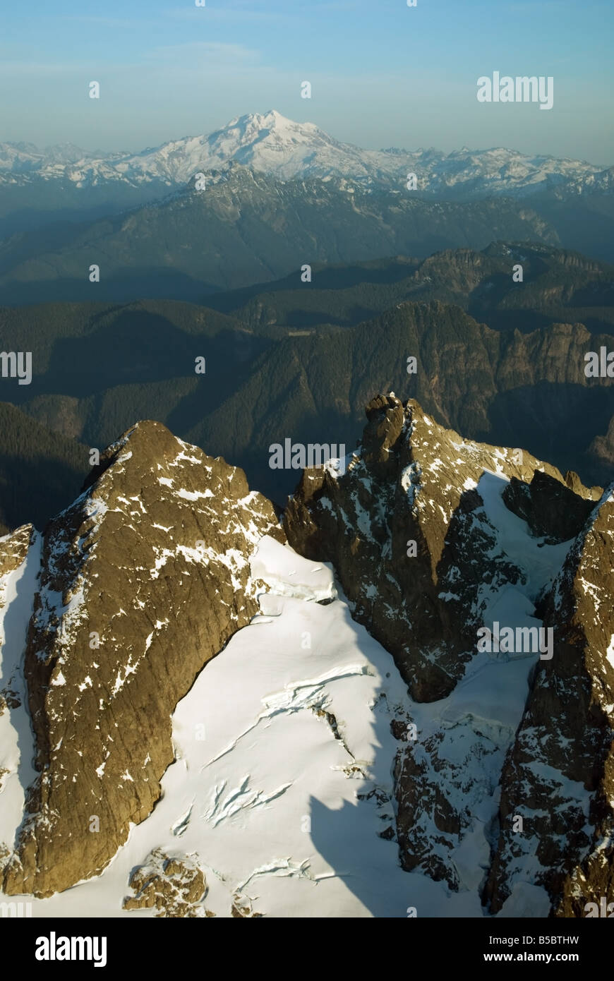 an-aerial-view-of-three-fingers-mountain-and-it-s-fire-lookout-with-glacier-peak-in-the