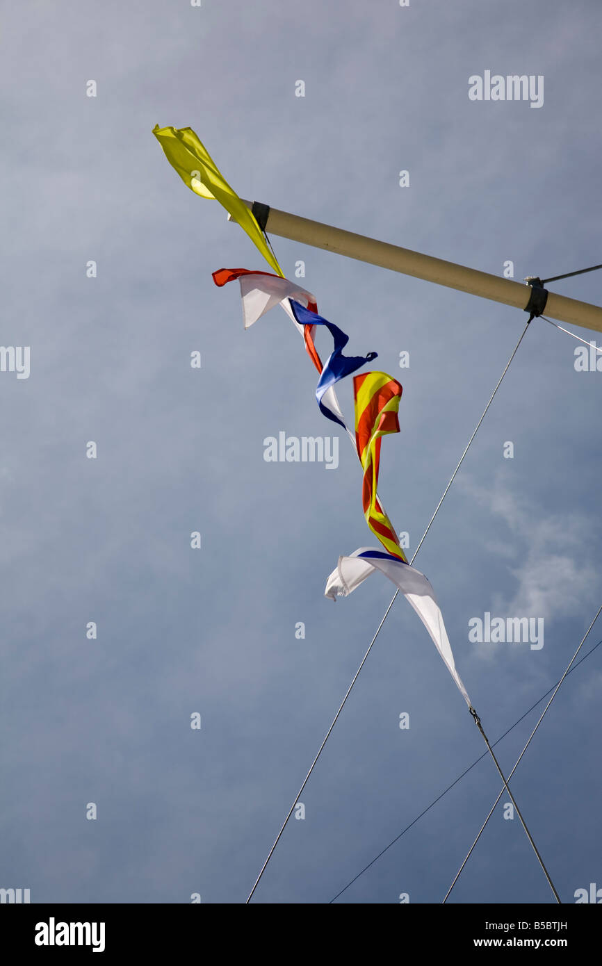 Marine flags flying from a mast, Portsmouth, Hampshire, England Stock