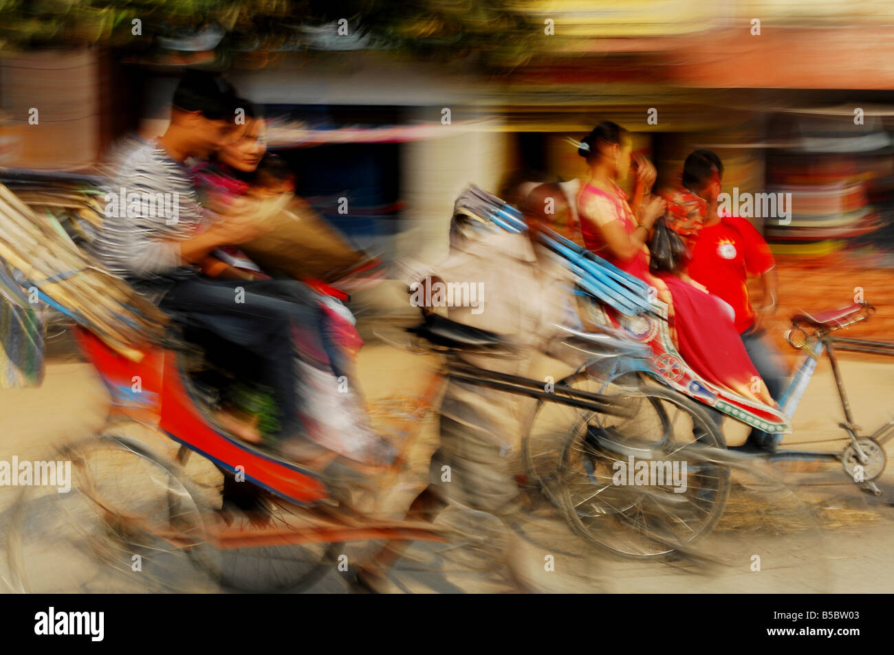 Rickshaws in motion Stock Photo