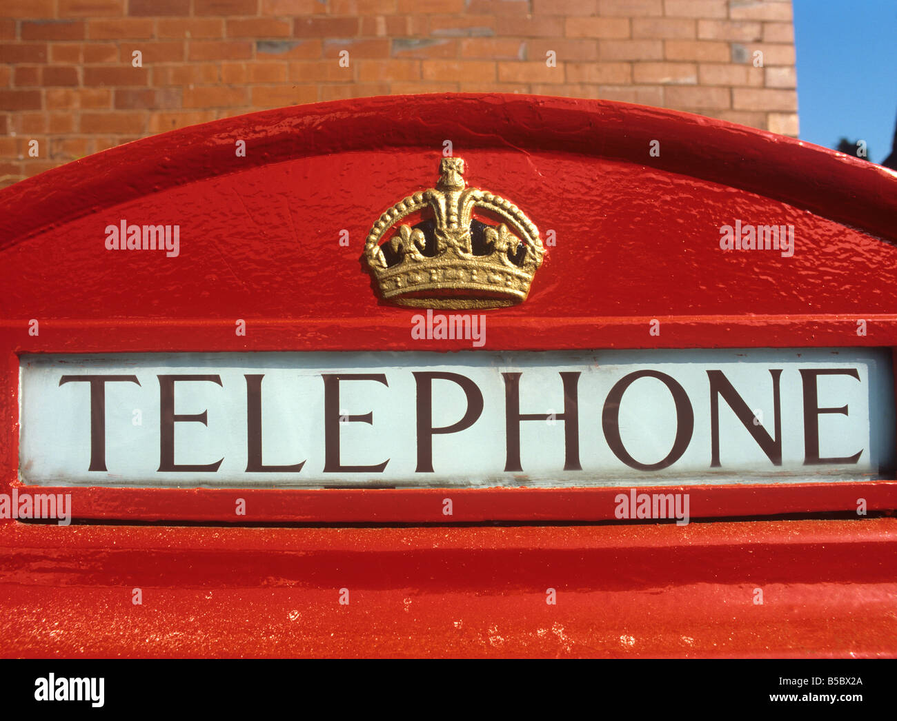 UK England K6 Phone Box Restored Telephone sign crown Stock Photo