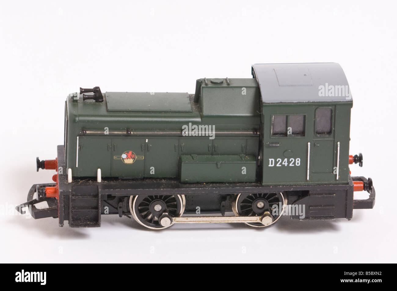 Close up of a  Hornby shunter model train in green livery shot against a white background (cut out) in a studio environment Stock Photo