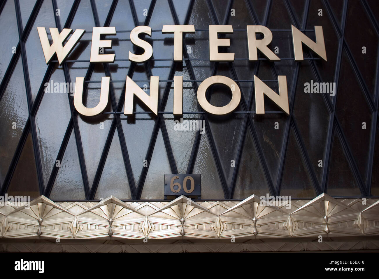 Western Union sign above the entrance to the 1930s art deco building, New York. Stock Photo