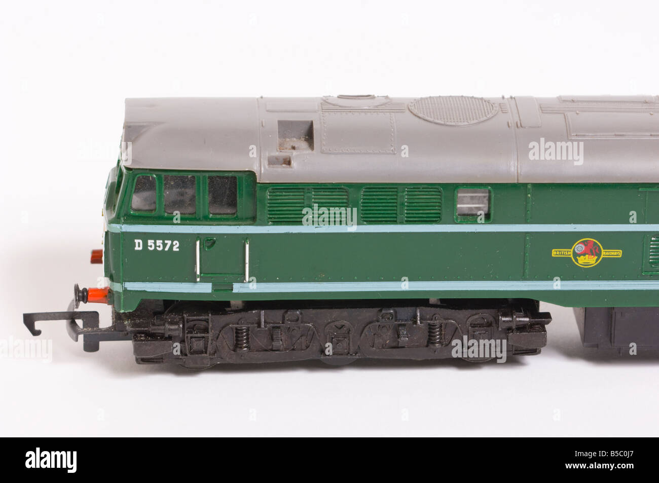 Close up of a Hornby diesel model train in green livery shot against a