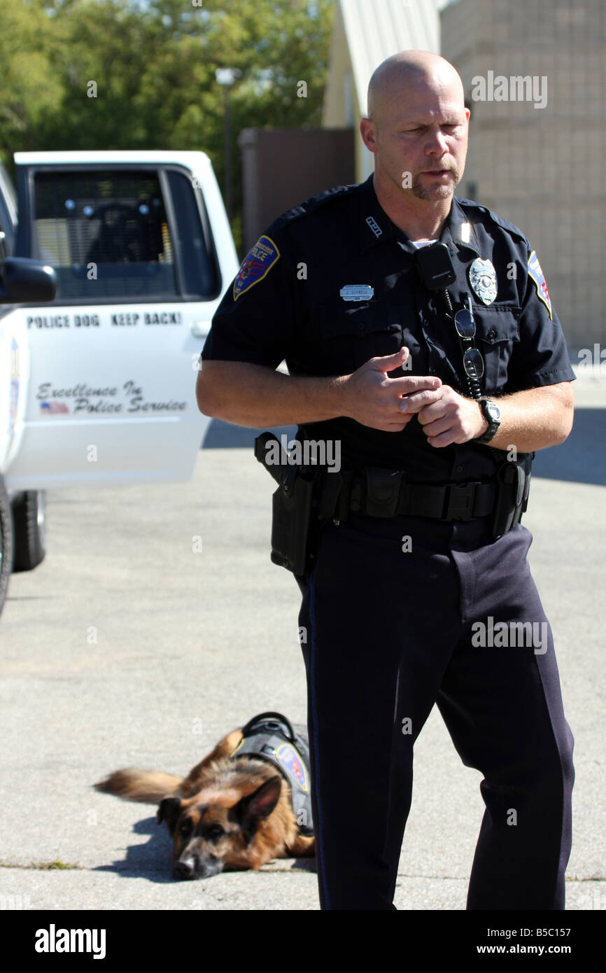 Germantown Police Department and K 9 drug searching dog talking to a crowd Stock Photo