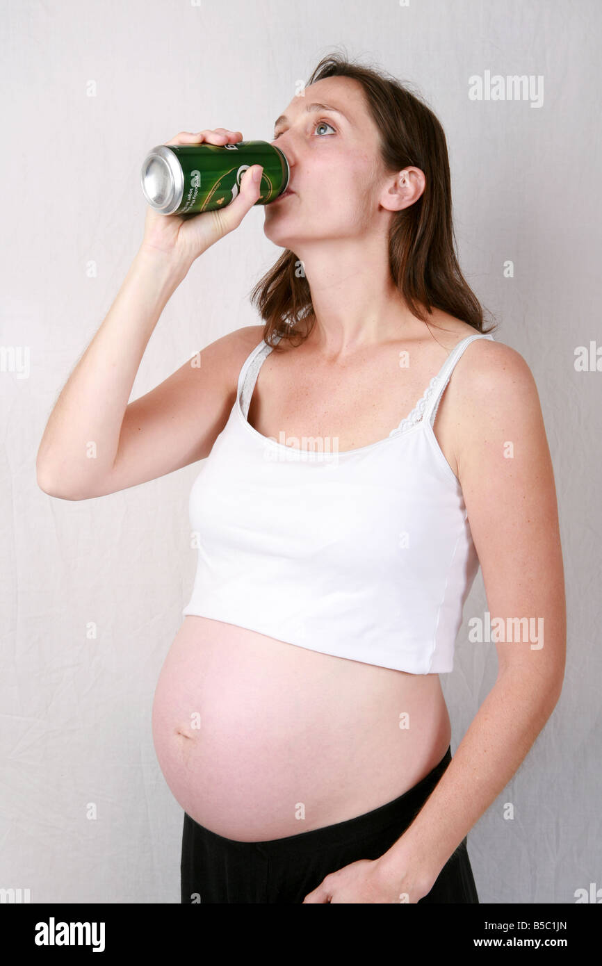 Pregnant woman drinking beer hires stock photography and images Alamy