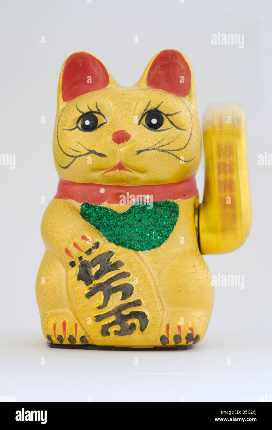 A waving cat statue Stock Photo - Alamy