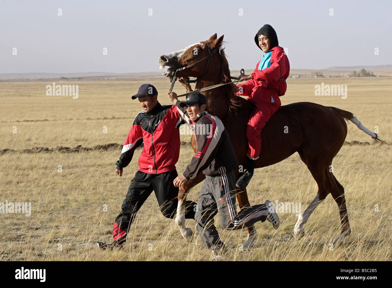 Participants Of Kazakh National Entertainment Races On Horses Stock 