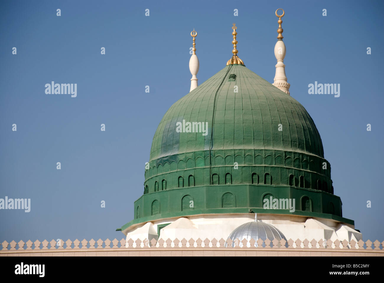 The green dome of Masjid al Nabawi in Madinah under which the Prophet Muhammed is buried Saudi Arabia Stock Photo