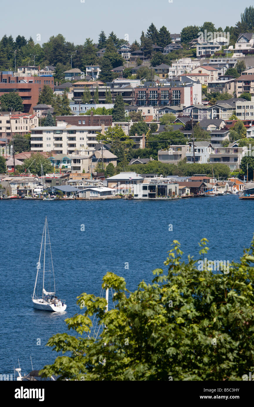 Sailboat moored in Lake Union across from Eastlake Neighborhood in