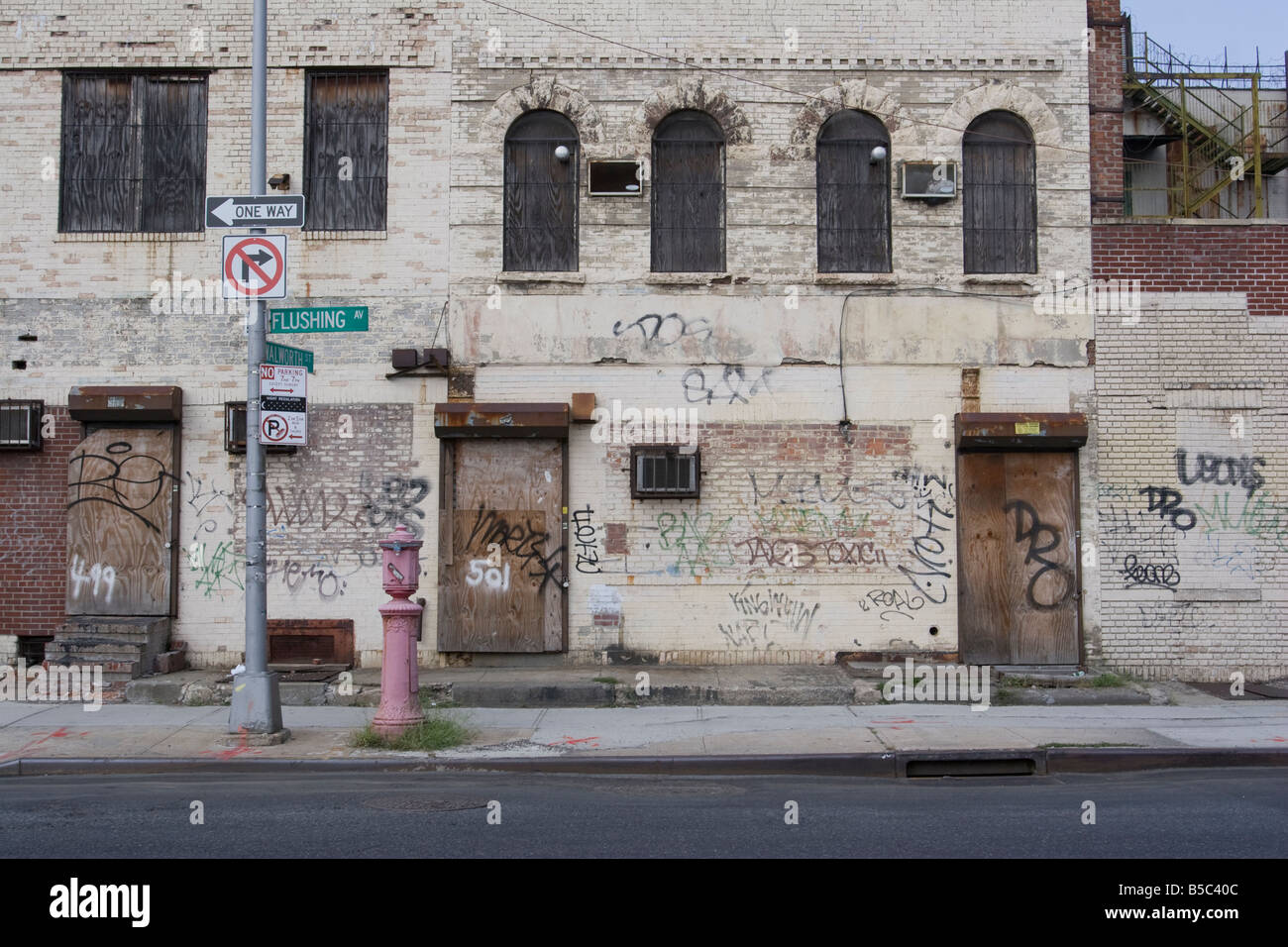 Boarded up warehouse building on Flushing Avenue in Brooklyn New York Stock Photo Alamy