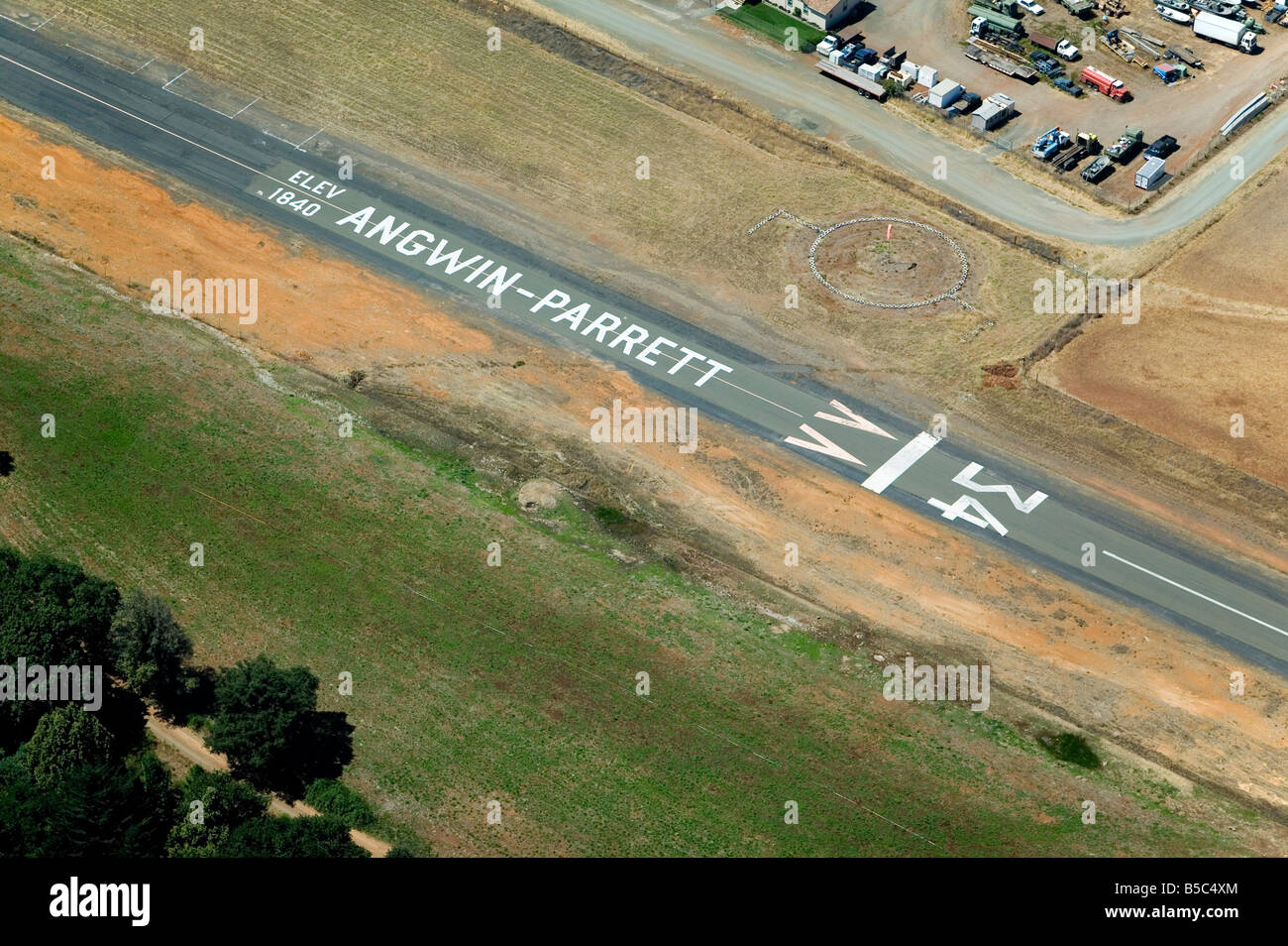 aerial view above displaced threshold at Angwin Parrett airport Napa valley California Stock Photo