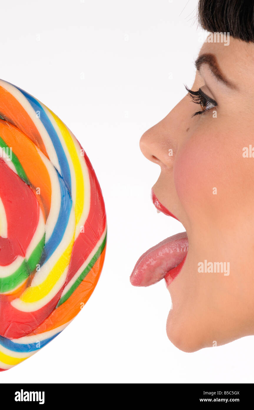 Young girl with a large lollipop Stock Photo
