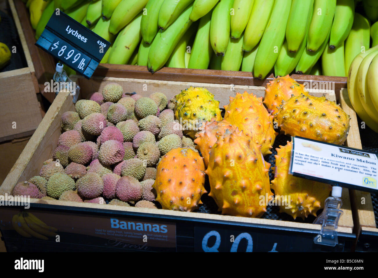 Bananas, Lychees and Kiwano Melon for sale at market in Seattle, Washington. Stock Photo