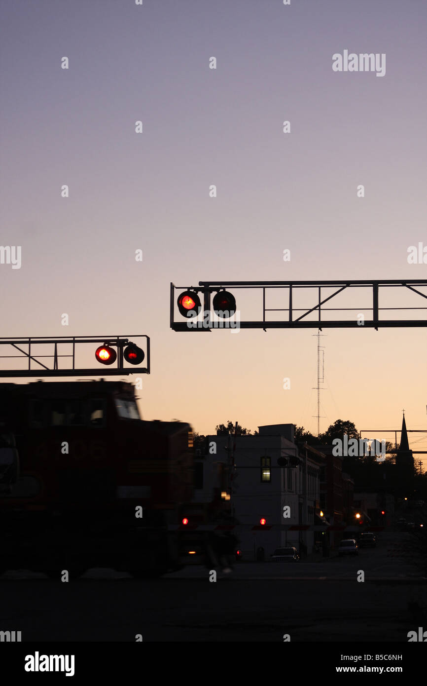 A train at a railway train crossing in Hannibal Missouri Stock Photo