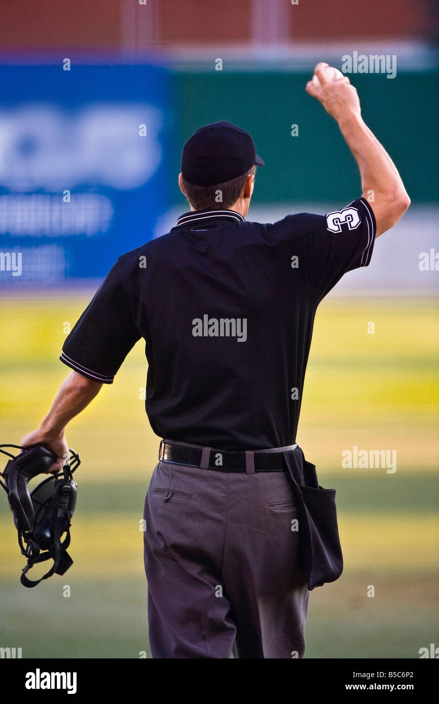 Baseball umpire with mask and ball Stock Photo Alamy