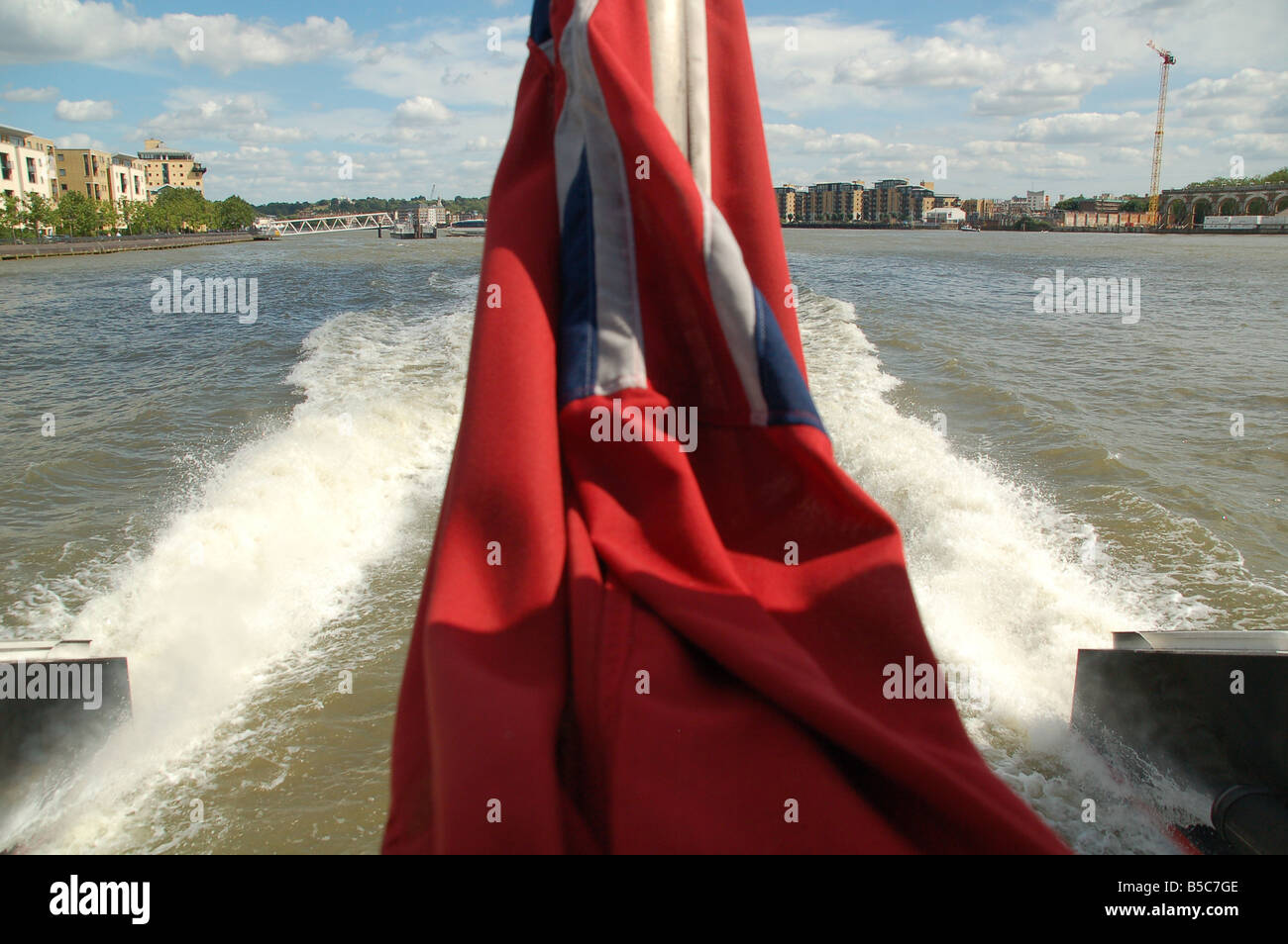 Travelling up the river Thames on the Thames Clipper jet boat in London England UK Stock Photo