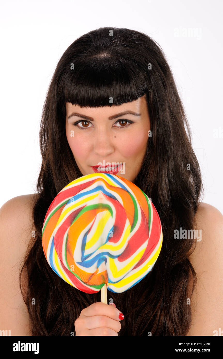 Young girl with a large lollipop Stock Photo