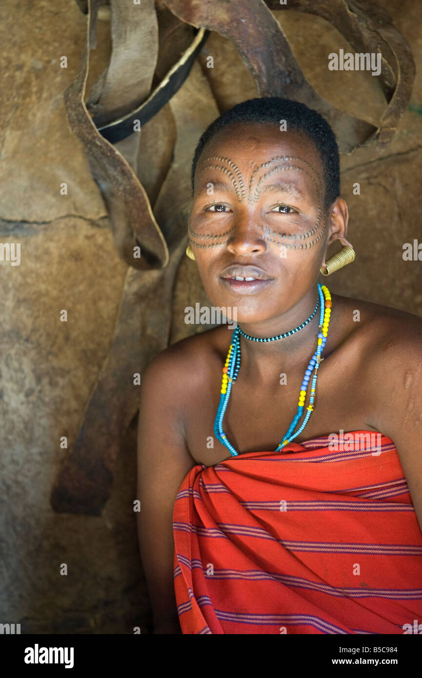 Portrait of a woman of the Datooga tribe with beauty scarring around her eyes Lake Eyassi Tanzania Stock Photo