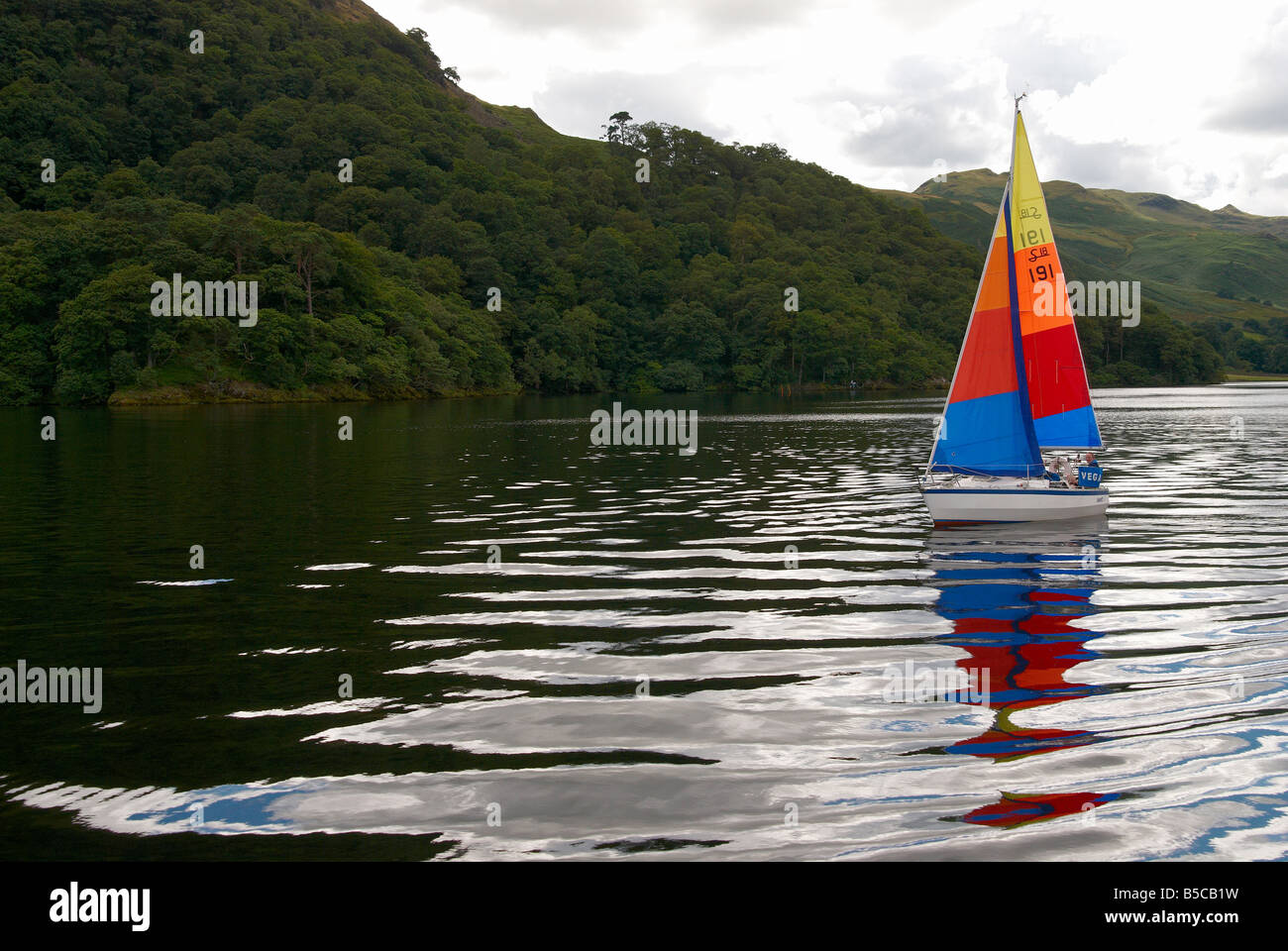 Colourful dinghy hires stock photography and images Alamy