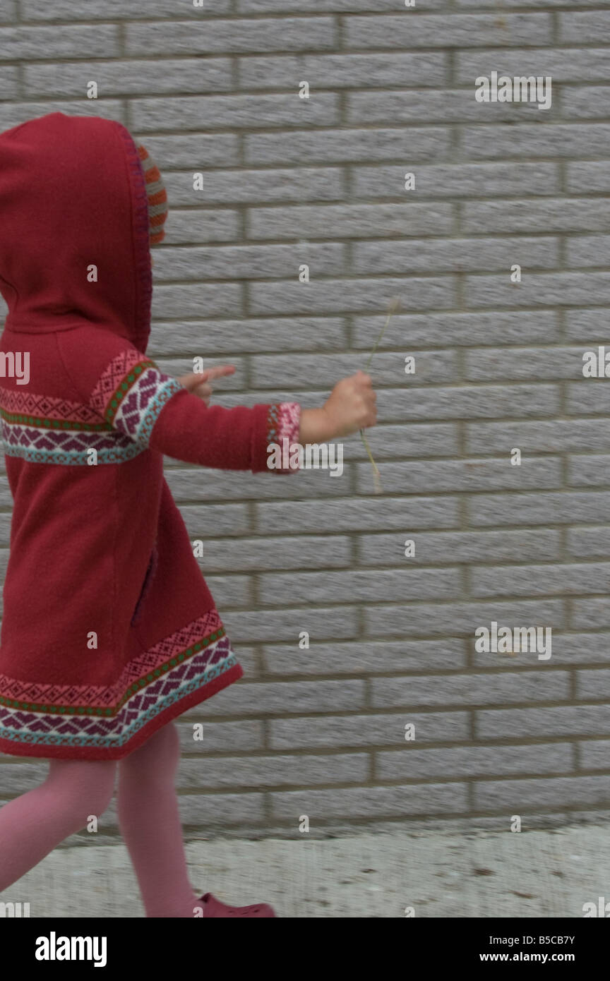 Young girl walking home Stock Photo Alamy