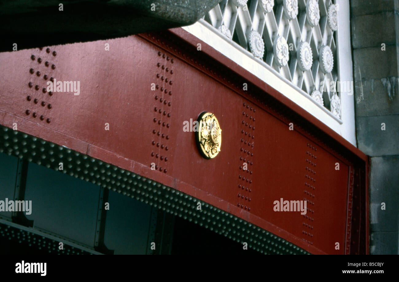 Bridge England gold London medallion metal ornate railing red rivets ...