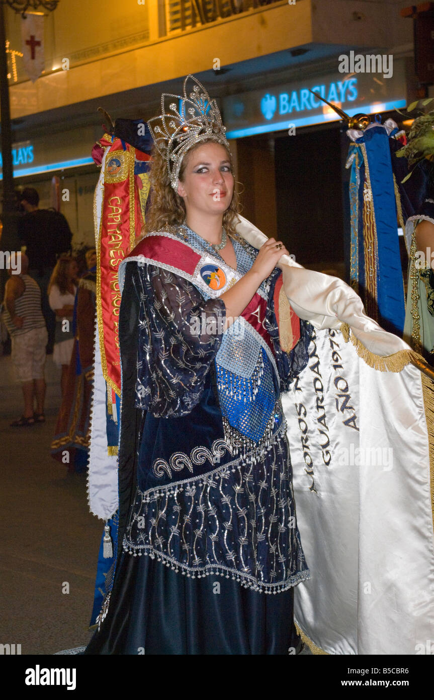 Person Female Moor Flagbearer in Traditional Costume at the Fiesta of Moors and Christians Guardamar Spain Spanish Fiestas Stock Photo