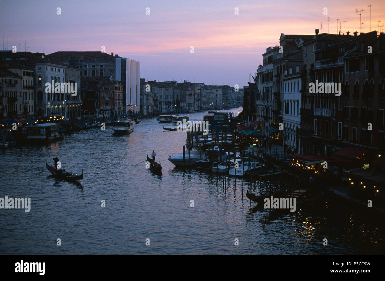 Gondolas on the Grand Canal at sunset in Venice Italy Stock Photo - Alamy
