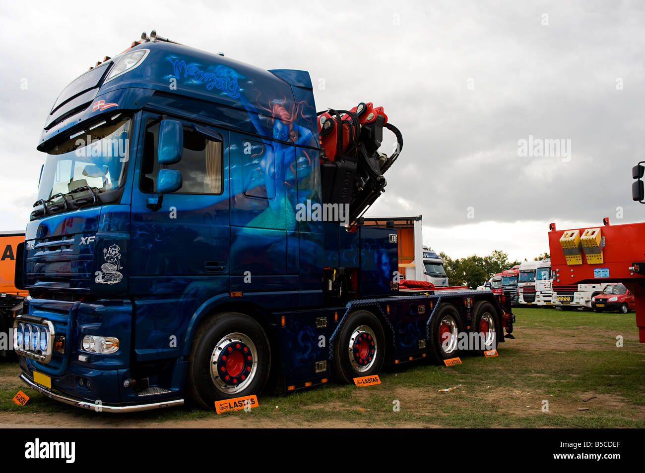 DAF XF truck decorated with motifs of a mermaid The truck is styled with a lot of details The license plate is modified Stock Photo