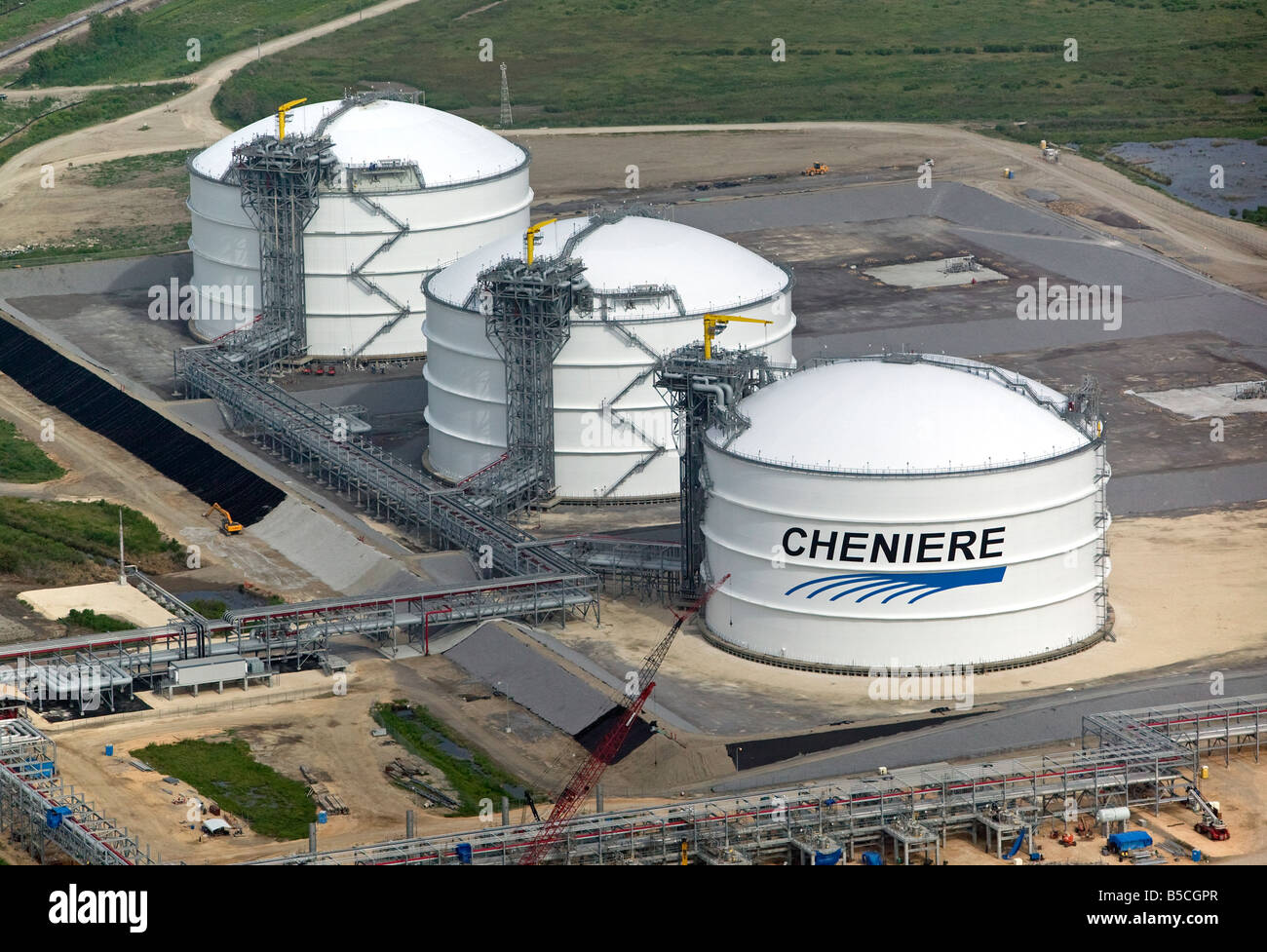 aerial view above Cheniere Energy liquified natural gas storage facility tanks Stock Photo