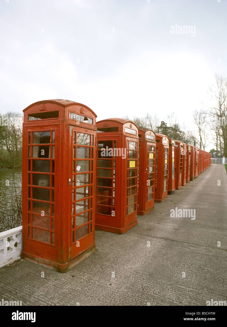 UK Oxfordshire Wantage 26 K6 and K8 Phone boxes in Michael Greenes drive in 1980s Stock Photo