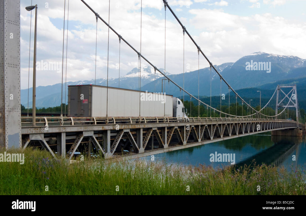 truck on Route 1, Trans-Canada Highway bridge over the Columbia river at Revelstoke, British Columbia Canada Stock Photo