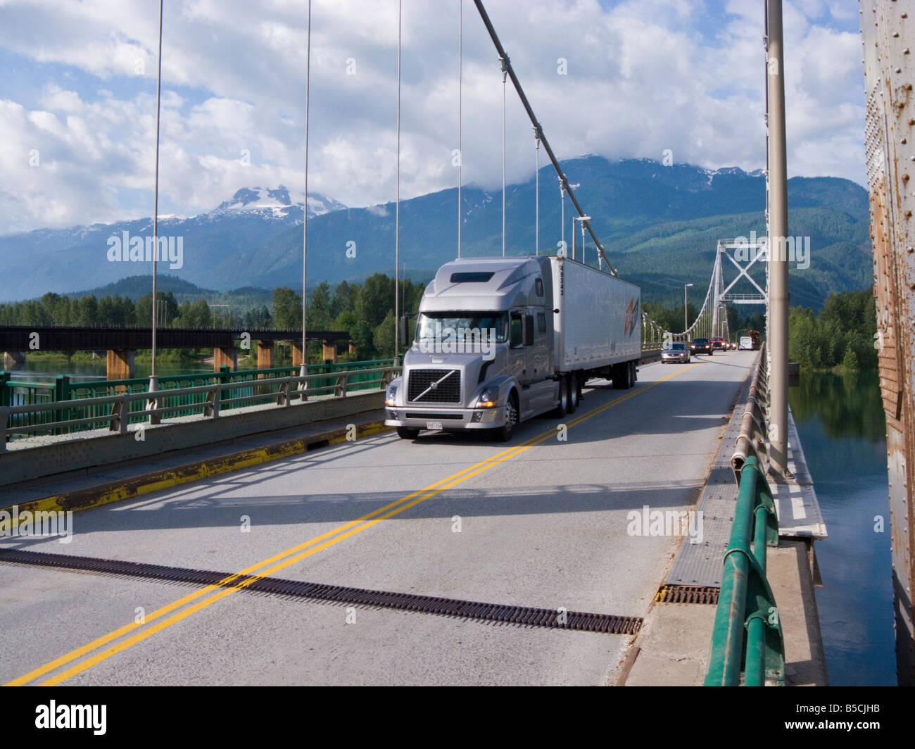 truck on Route 1, Trans-Canada Highway bridge over the Columbia river at Revelstoke, British Columbia, Canada Stock Photo