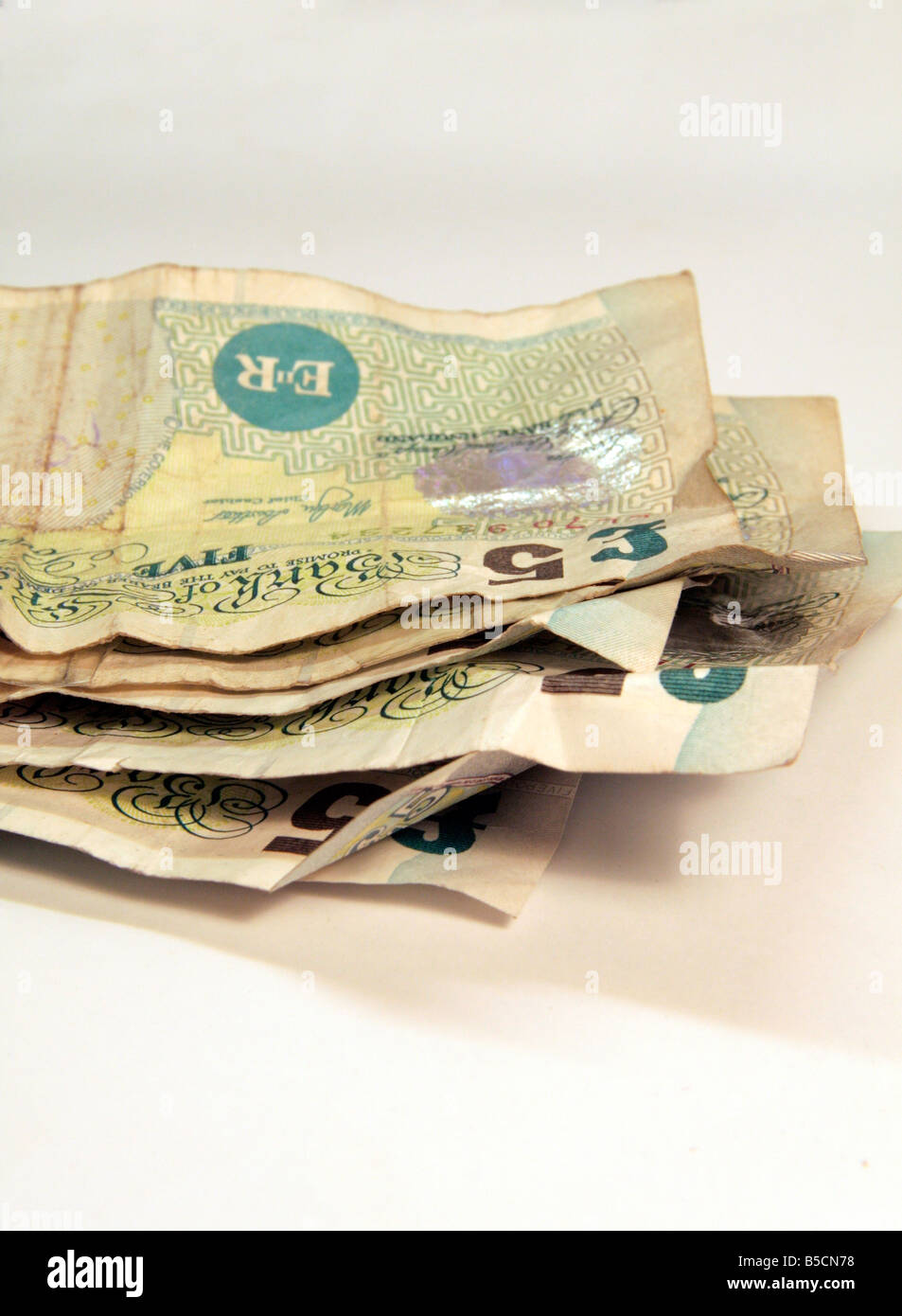 Old Five pound notes still in circulation some repaired with