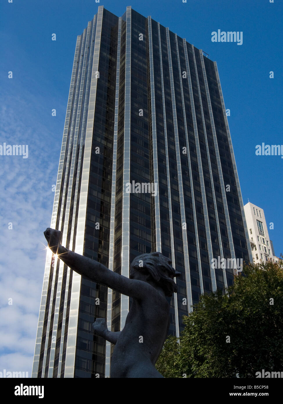 Skyscraper and statues at Columbus Circle is an entrance to Central