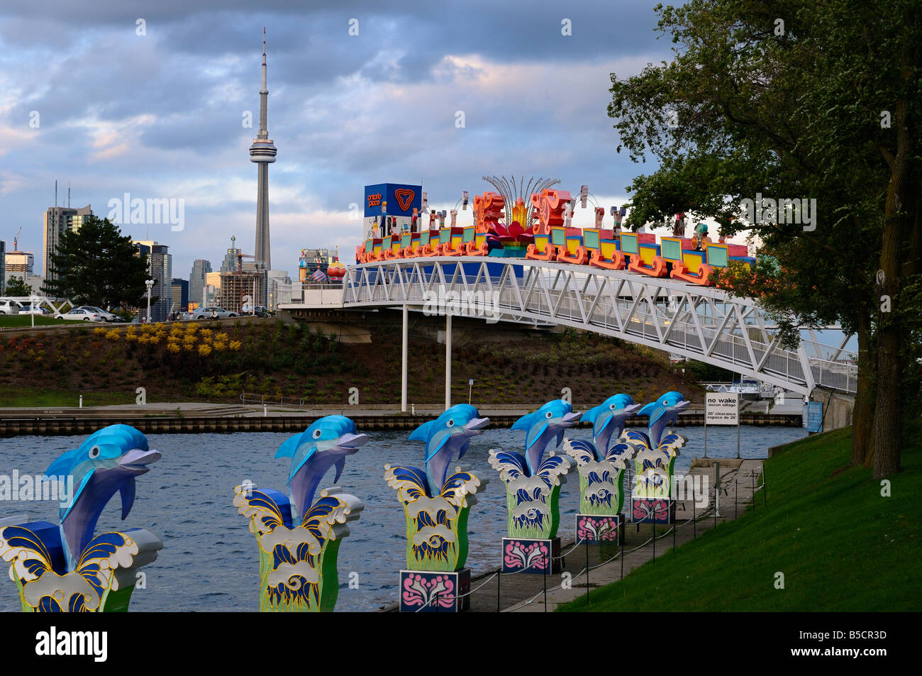 Toronto skyline at dusk with CN Tower and Chinese Lantern Festival displays from Ontario Place Stock Photo