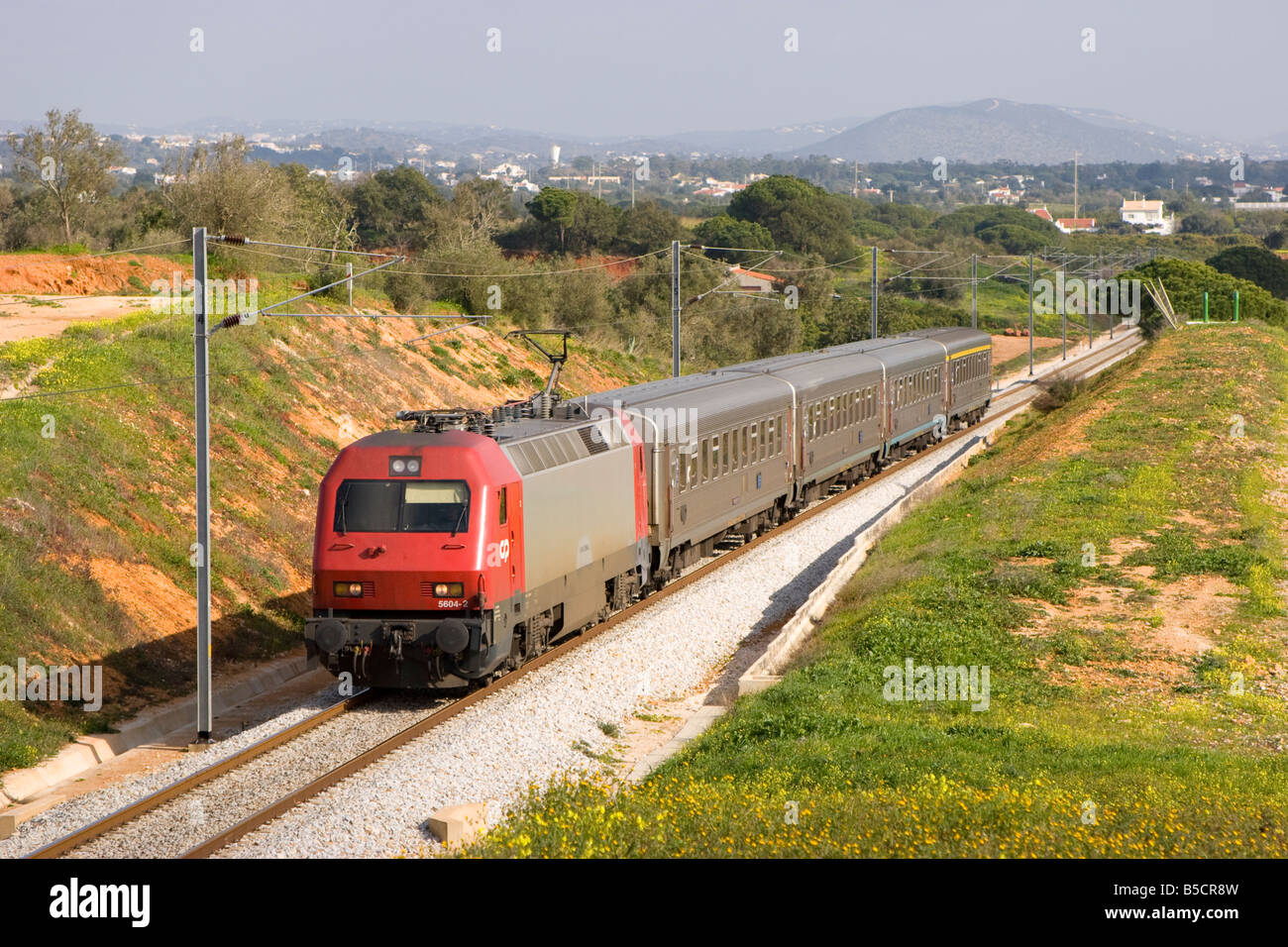 Loco hauled Intercidades CP passenger service near Pata on the Algarve Portugal Stock Photo