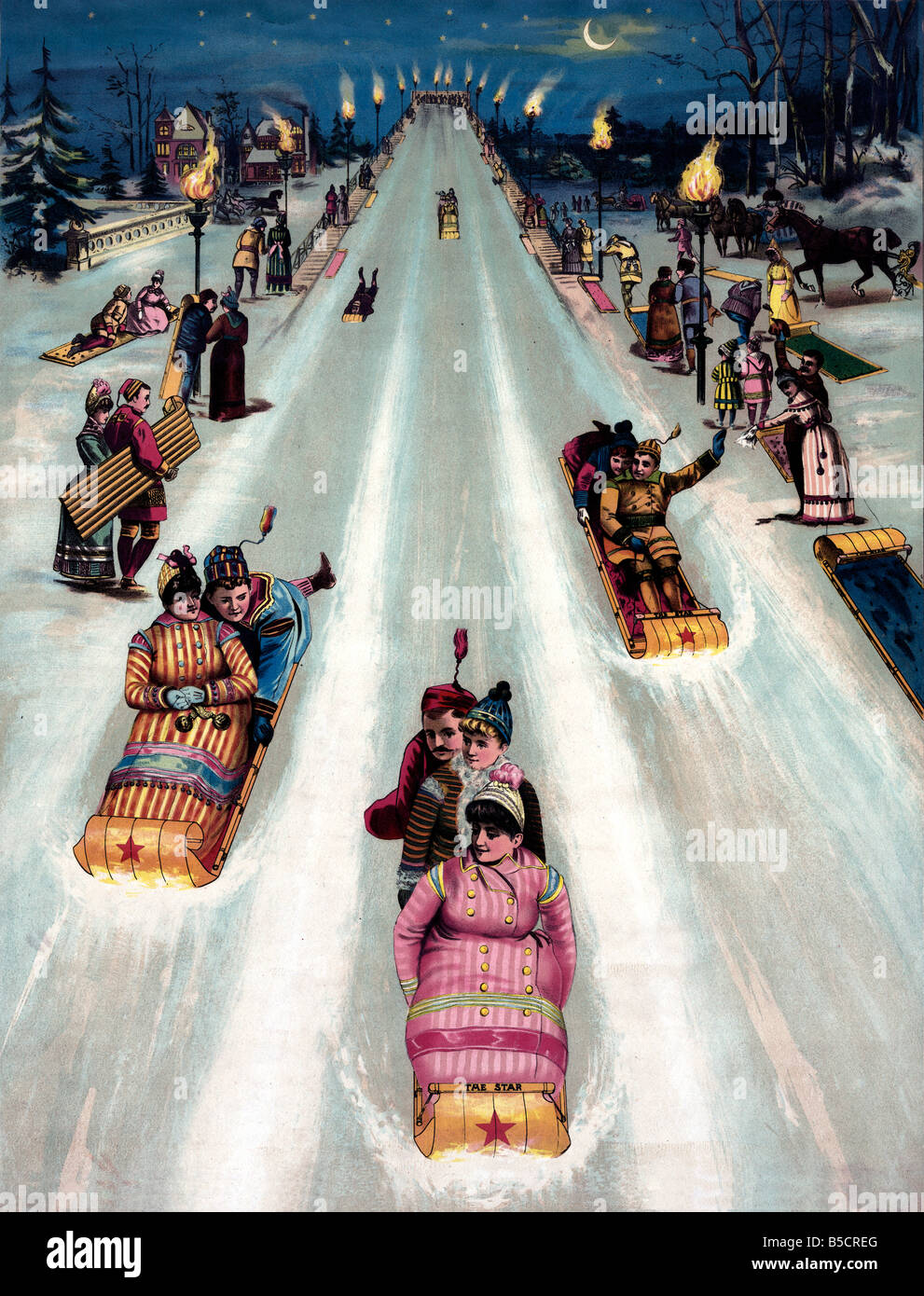Showing People Having Fun And Sledding Downhill At Night Stock Photo