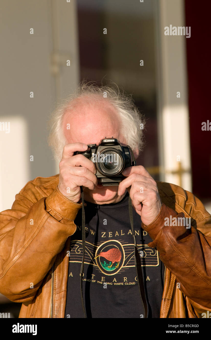Man with a canon camera hi-res stock photography and images Adult Pic Hq